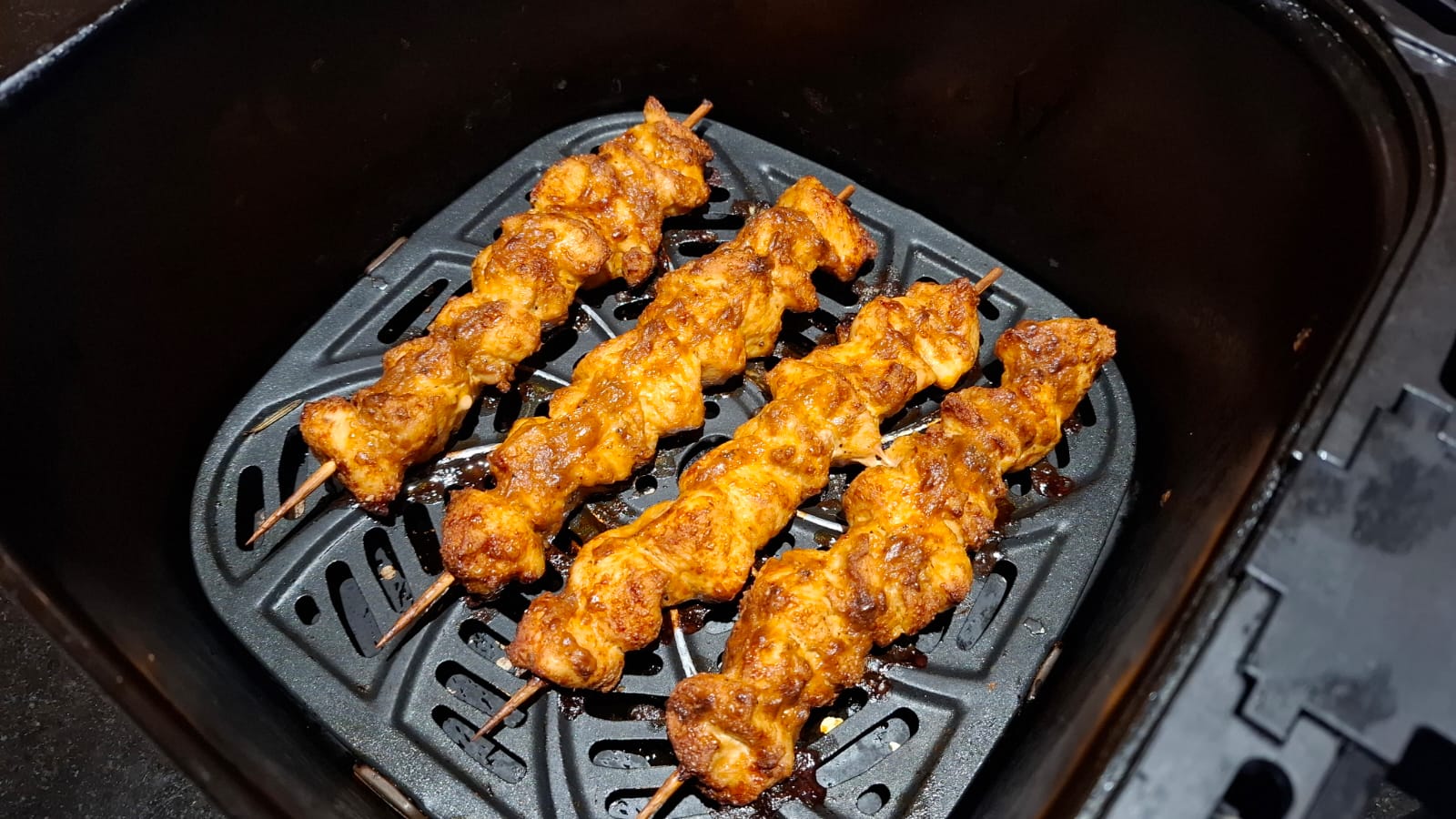 Chicken sosaties cooking in the air fryer